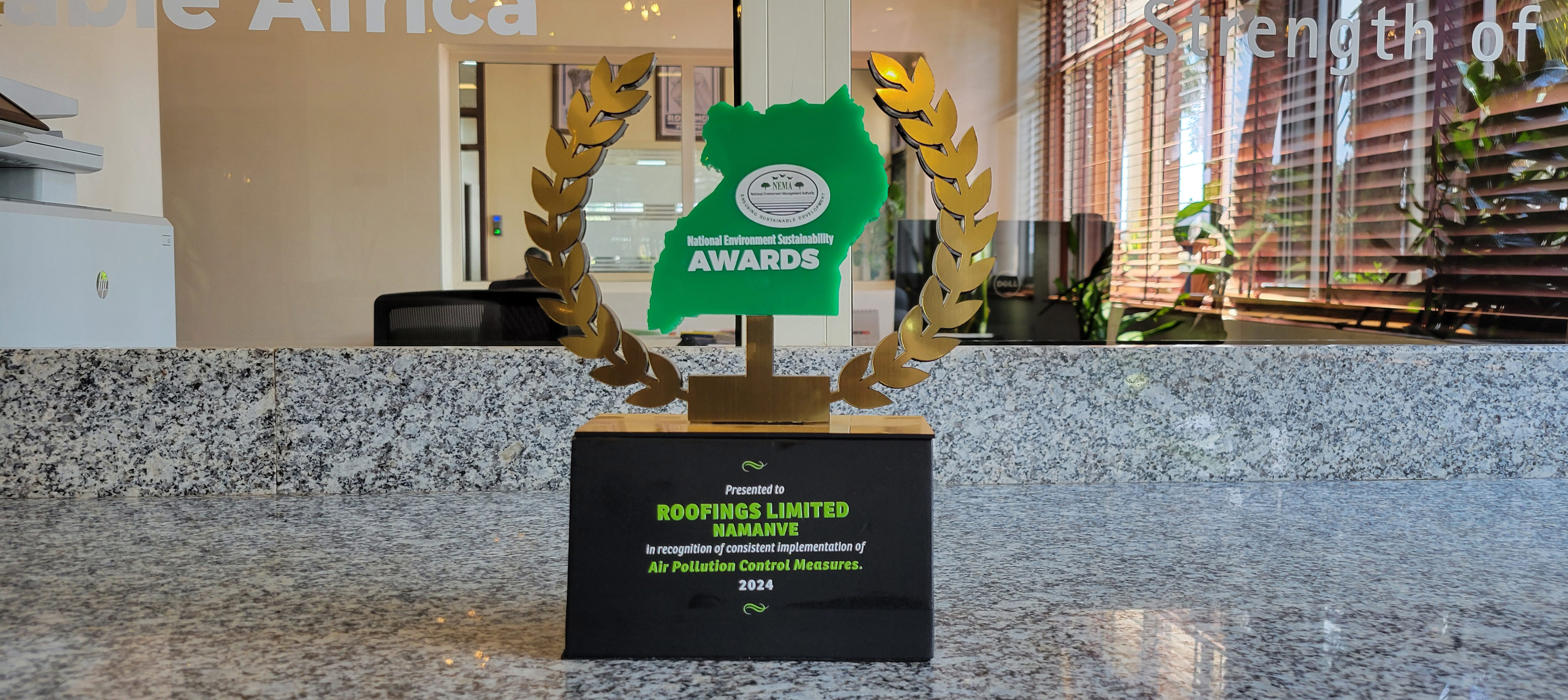 Roofings Wins NEMA Environmental Award for the year 2024: Leading Air Pollution Control in Uganda’s Steel & Construction Sector